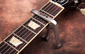 JOYO JCP-02 Opener Capo каподастр для акустической/электрогитары, с открывашкой